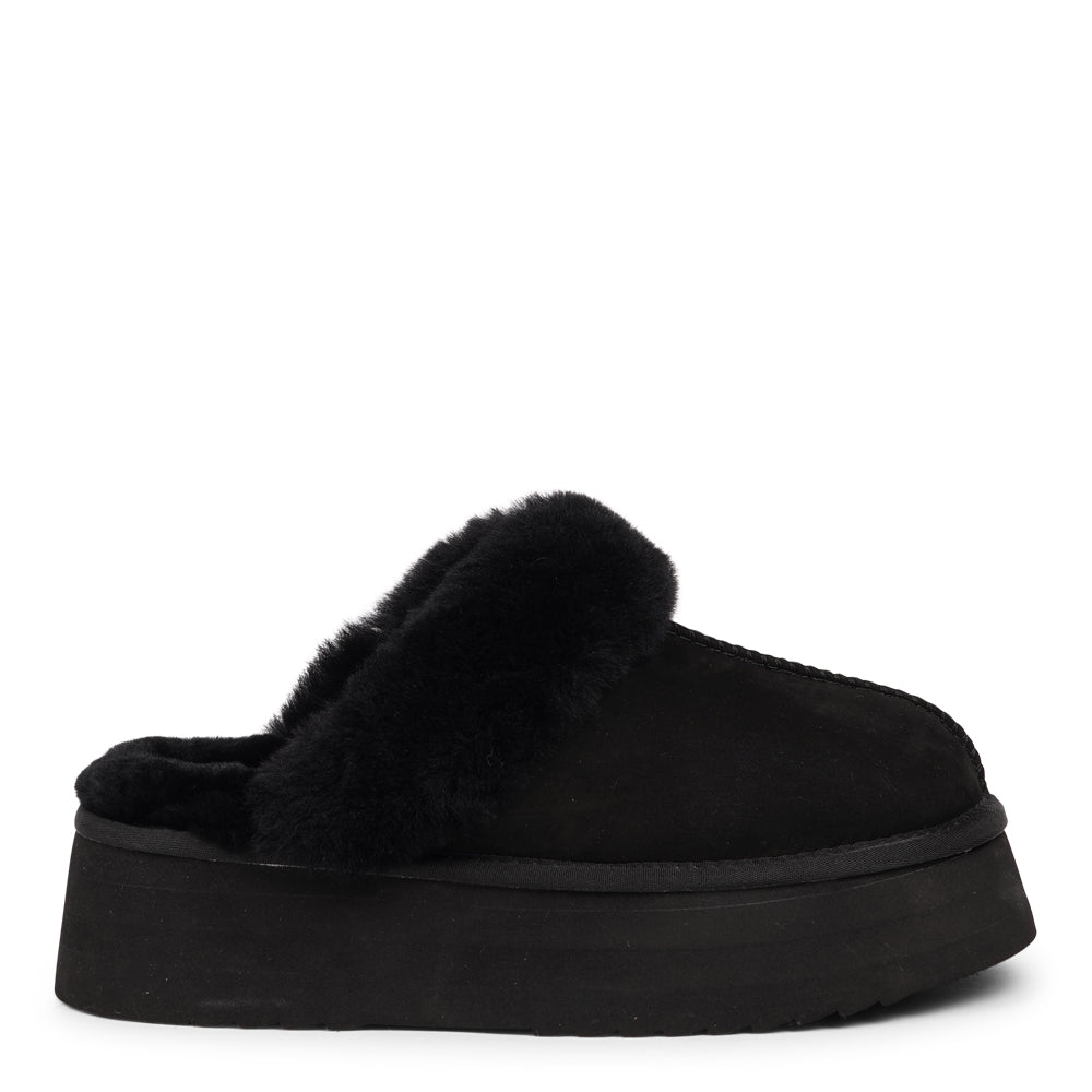Lovelies - What sets the Robson mules apart is their plush shearling lining, which envelops your feet in a cloud-like cocoon of comfort. The shearling not only adds a touch of opulence but also provides natural insulation, keeping your feet toasty even on the chilliest of days.
But comfort isn't just skin-deep with the Robson mules. The combination of premium nubuck and the resilient rubber sole ensures durability and longevity, making these mules a dependable choice for daily wear.