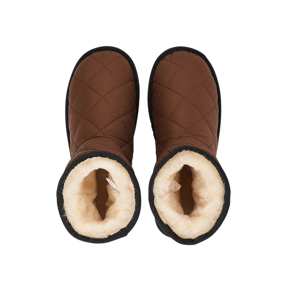Designed to keep your feet cozy and stylish all autumn long. Experience ultimate softness and warmth as the luxurious shearling lining wraps your feet in comfort. With their soft and durable rubber soles, these boots provide a perfect combination of flexibility and durability, making them ideal for the wintertime. No need to worry about wet weather – the quilted nylon material is water-resistant, keeping your feet dry and comfortable even on rainy days.