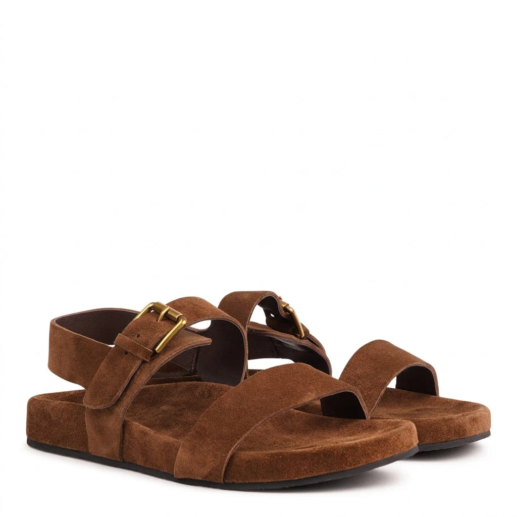 The adjustable strap over the instep allows for a personalized fit, while the soft PU rubber insole, covered in high-quality leather, provides cushioned support that molds to your foot over time. Finished with a sleek leather upper, these sandals bring together luxury and practicality in one effortless design.