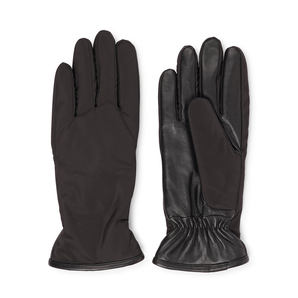 Lovelies Studio - The Sandria gloves combine functionality and luxury with their insulated nylon exterior and plush fleece lining. The fine lambskin palm adds a touch of sophistication and ensures a comfortable grip.
Perfect for staying warm and stylish, Sandria offers both protection and elegance in colder weather.