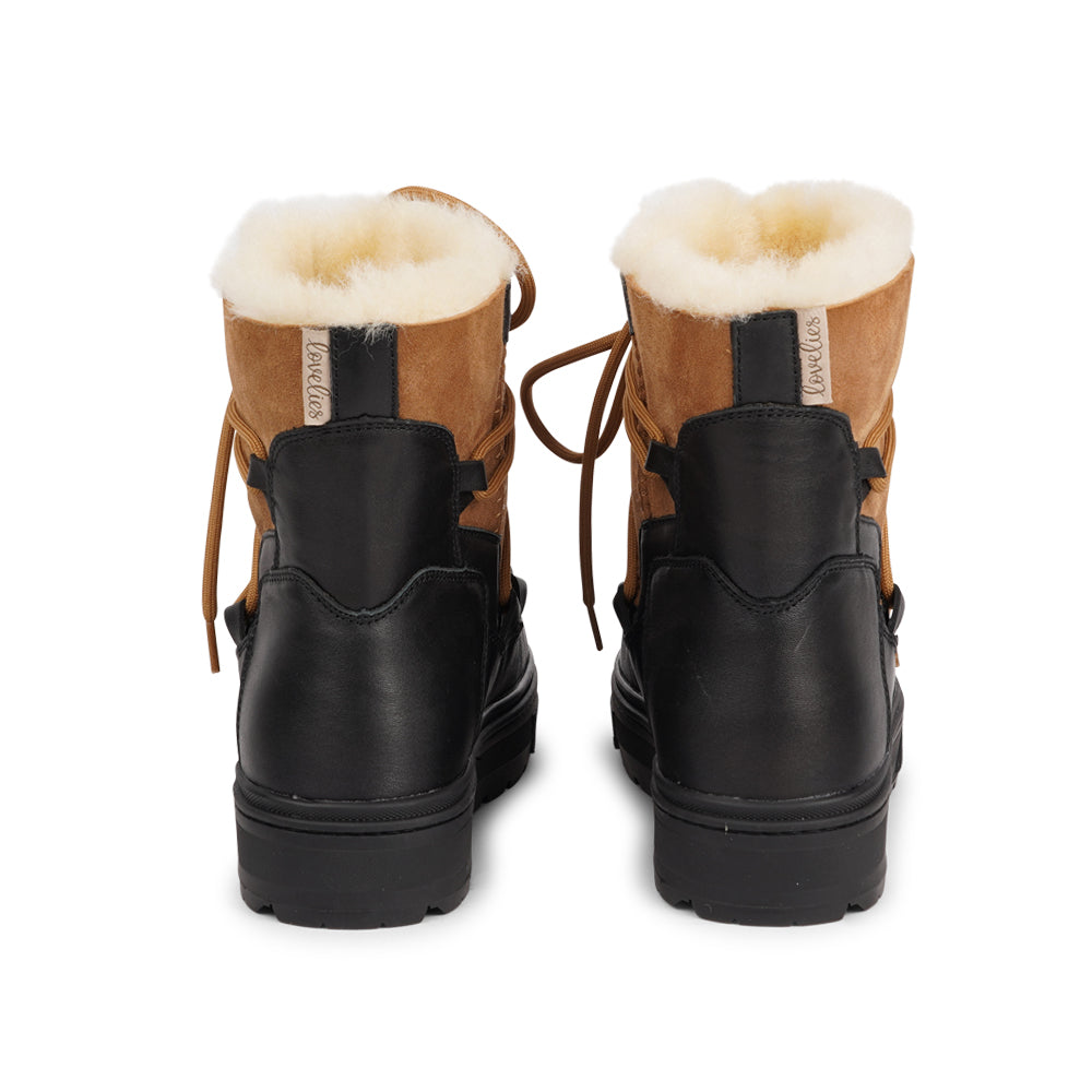 High quality shearling boots Lovelies shearling boots bring softness and warmth to your feet this autumn. With soft and durable rubber soles plus a gorgeous design you're perfectly suited for the wintertime. Enjoy your Lovelies!