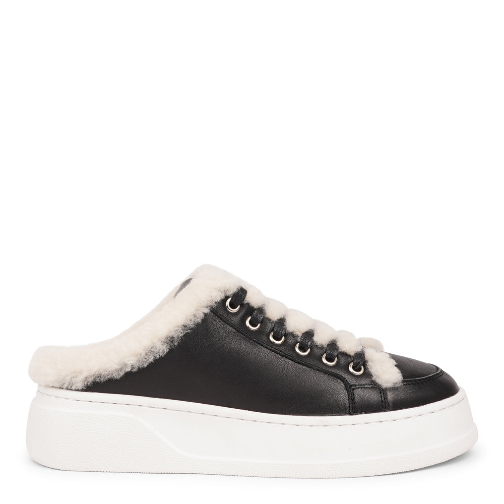 Style Selva from Lovelies. The upper is adorned with suede and features charming shearling details, adding a touch of luxury to your every step. Whether you're dressing up for a night out or aiming for a more casual look, these sneakers effortlessly elevate your style.
With a full innersole and lining of plush shearling, your feet are cocooned in comfort and warmth. This luxurious lining not only keeps you toasty but also molds around your feet, providing a custom fit like no other.