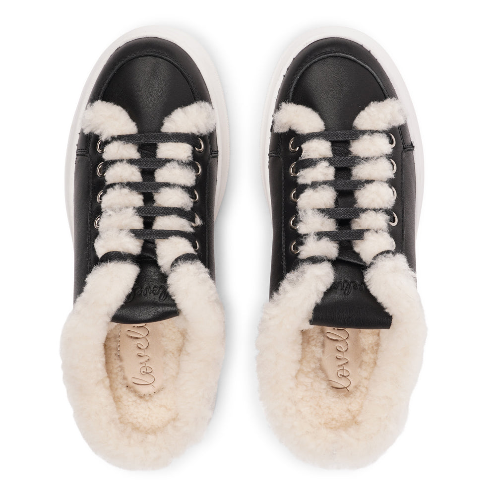 Style Selva from Lovelies. The upper is adorned with suede and features charming shearling details, adding a touch of luxury to your every step. Whether you're dressing up for a night out or aiming for a more casual look, these sneakers effortlessly elevate your style.
With a full innersole and lining of plush shearling, your feet are cocooned in comfort and warmth. This luxurious lining not only keeps you toasty but also molds around your feet, providing a custom fit like no other.