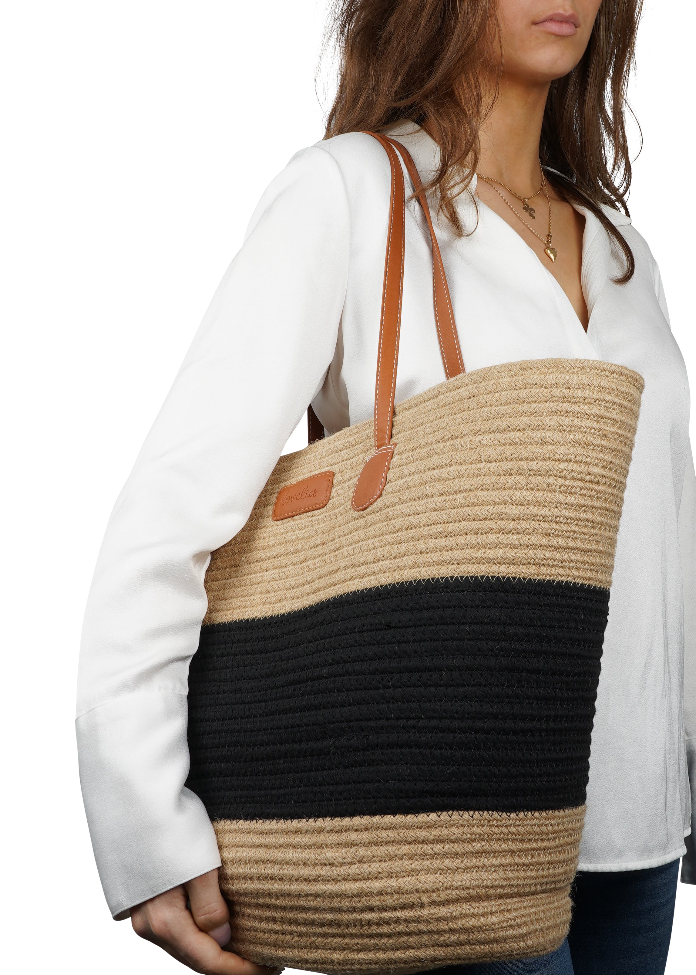 Lovelies Studio - Introducing the Simius jute rope bag, the perfect blend of sustainable style and practical design. This large tote bag features a secure zip closure to keep your belongings safe, while the long shoulder handles crafted from vegan leatheroffer both comfort and durability.
Whether you’re heading to the beach, shopping, or on your way to a casual outing, Simius is your go-to companion for every occasion. Spacious, stylish, and eco-friendly, it’s the perfect addition to any wardrobe.
