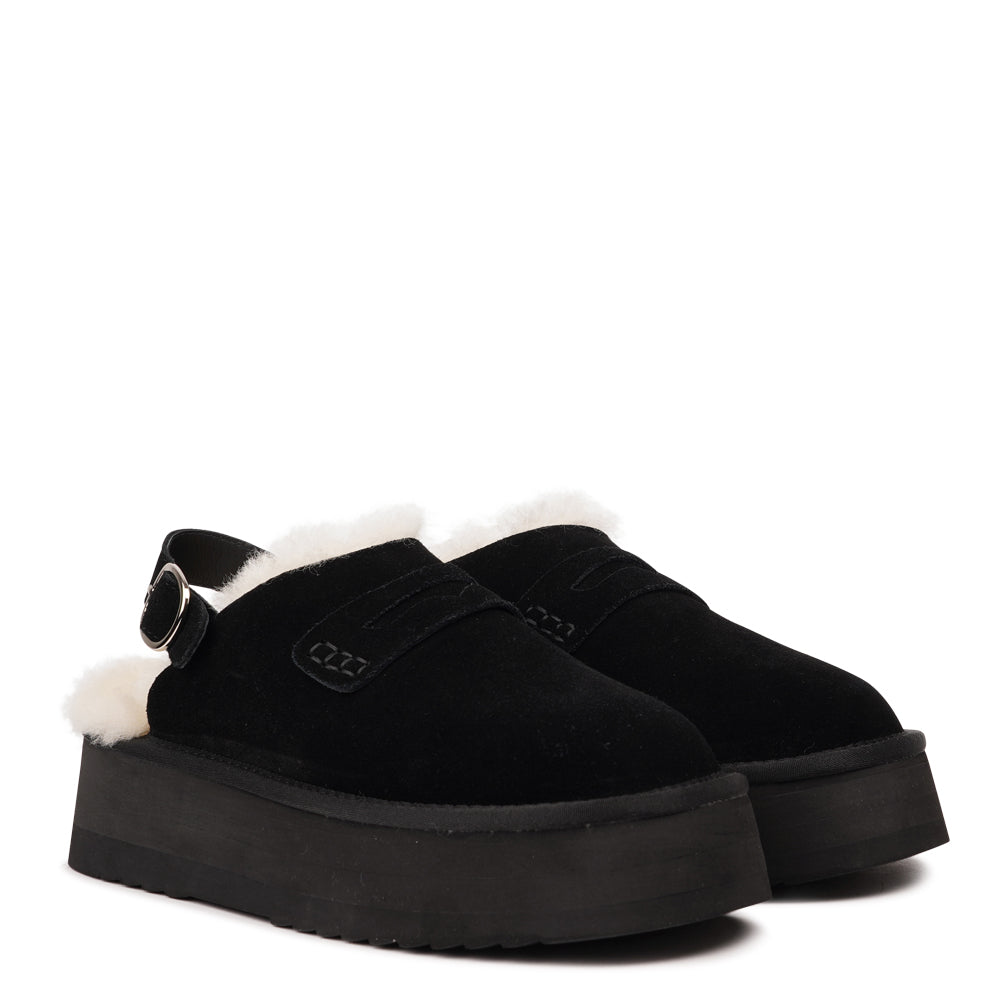 Step into a world of luxury and coziness with our Siple suede mules. Crafted with the finest suede, these mules are designed to provide not only elegance but also ultimate comfort for your feet. The sumptuous shearling lining ensures your feet stay warm and snug, making them the perfect choice for colder days.
The standout feature of the Siple mules is the adjustable heel strap, allowing you to customize the fit to your liking. This ensures a secure and comfortable feel as you walk, no matter where your da