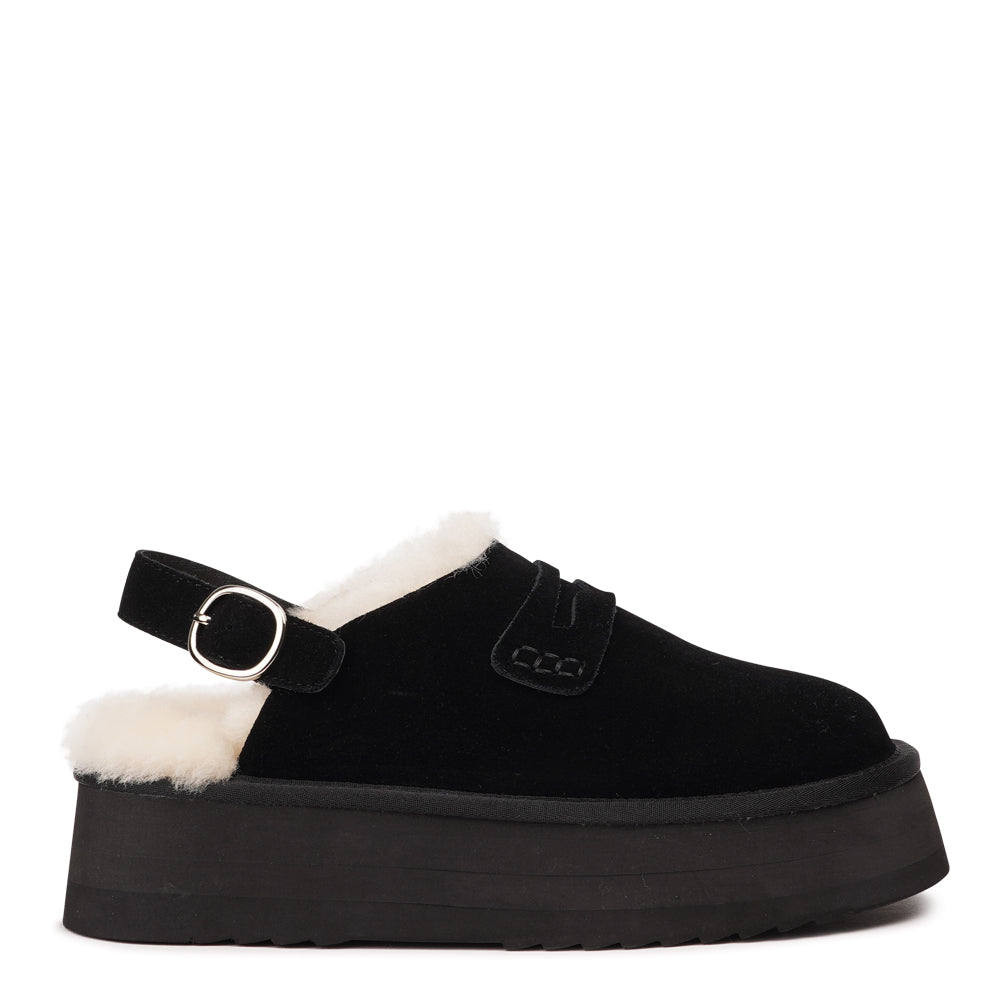 Step into a world of luxury and coziness with our Siple suede mules. Crafted with the finest suede, these mules are designed to provide not only elegance but also ultimate comfort for your feet. The sumptuous shearling lining ensures your feet stay warm and snug, making them the perfect choice for colder days.
The standout feature of the Siple mules is the adjustable heel strap, allowing you to customize the fit to your liking. This ensures a secure and comfortable feel as you walk, no matter where your da