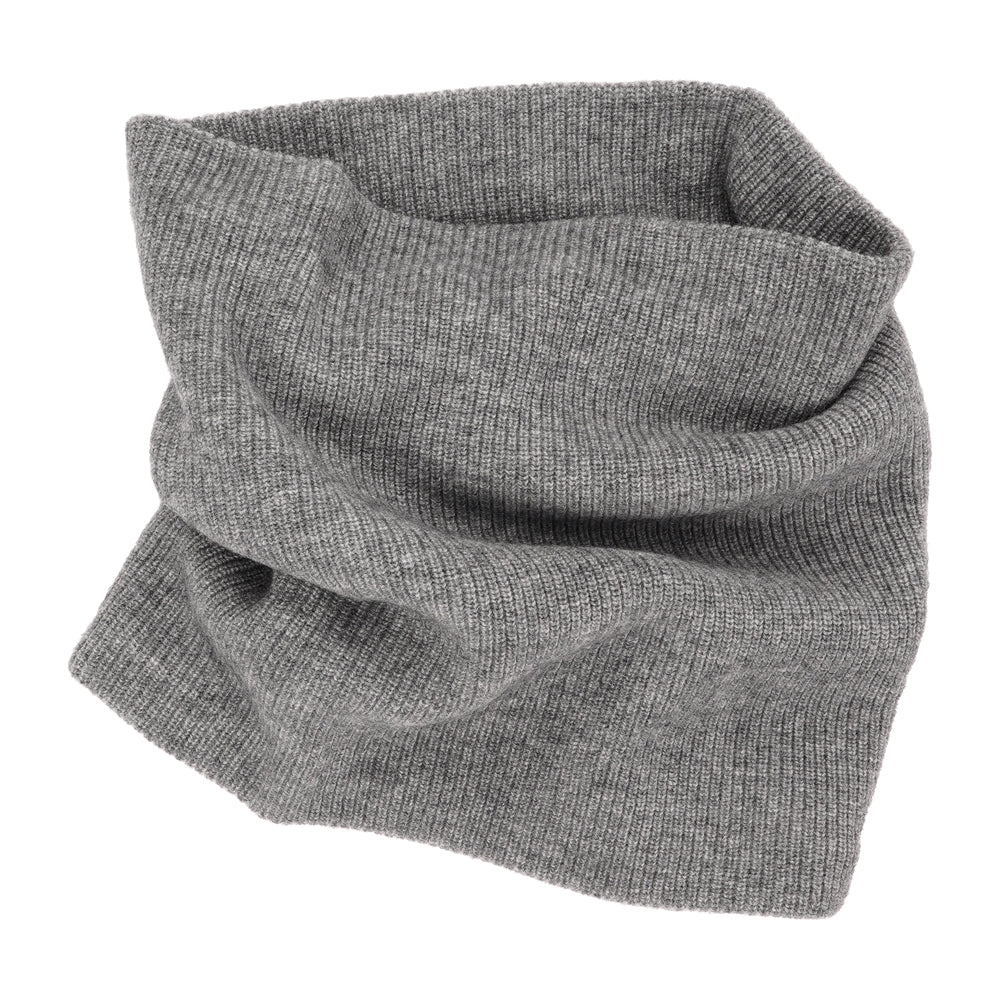 Lovelies - Crafted from a blend of 70% fine wool and 30% cashmere, this neck warmer is the perfect marriage of warmth and luxury. Its sumptuously soft texture and exquisite craftsmanship make it a must-have accessory for any fashion-forward individual.  The Tamaro knitted neck warmer not only keeps you cozy but also adds a touch of elegance to your outfit. Its fine wool and cashmere blend create a beautifully soft and comfortable neck warmer that's as stylish as it is warm.