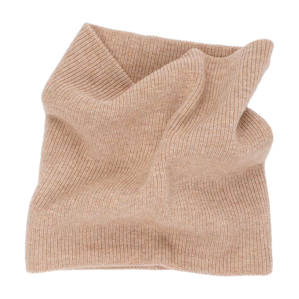 Lovelies - Crafted from a blend of 70% fine wool and 30% cashmere, this neck warmer is the perfect marriage of warmth and luxury. Its sumptuously soft texture and exquisite craftsmanship make it a must-have accessory for any fashion-forward individual.  The Tamaro knitted neck warmer not only keeps you cozy but also adds a touch of elegance to your outfit. Its fine wool and cashmere blend create a beautifully soft and comfortable neck warmer that's as stylish as it is warm.