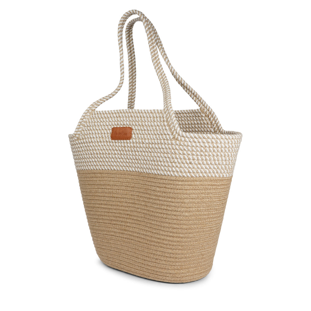 Meet the Tomba bag, where eco-friendly materials meet effortless style. Made from a durable blend of cotton and jute rope, Tomba is designed for those who love a chic, sustainable accessory that’s perfect for every day.
This two-tone stylish tote bag adds a modern touch to your look, while the long shoulder straps make it easy to carry, whether you’re out for a day of shopping, heading to the beach, or simply running errands.
Tomba – the perfect combination of style, comfort, and sustainability.