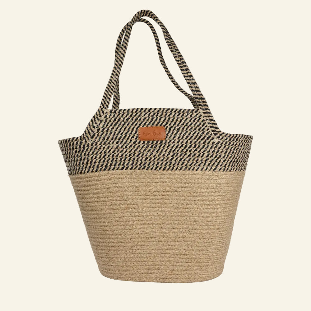Meet the Tomba bag, where eco-friendly materials meet effortless style. Made from a durable blend of cotton and jute rope, Tomba is designed for those who love a chic, sustainable accessory that’s perfect for every day.
This two-tone stylish tote bag adds a modern touch to your look, while the long shoulder straps make it easy to carry, whether you’re out for a day of shopping, heading to the beach, or simply running errands.
Tomba – the perfect combination of style, comfort, and sustainability.