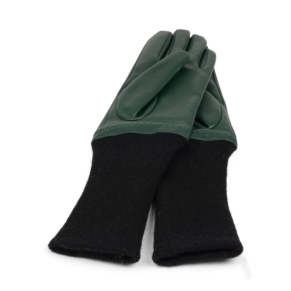 Elevate your winter wardrobe with the Udine gloves, a perfect blend of luxury and comfort. Crafted from soft, supple lambskin, these gloves offer a refined touch and a sleek silhouette. The extended knit cuff provides extra warmth and a snug fit, while adding a stylish, contemporary edge.
Designed for both elegance and practicality, Udine gloves are ideal for keeping your hands cozy during chilly days without compromising on style. A sophisticated accessory that pairs effortlessly with any winter outfit.