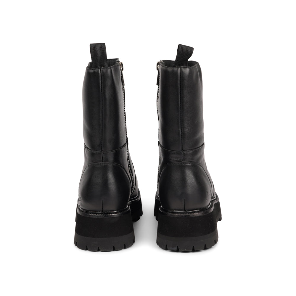 Brave the elements with confidence, thanks to Ushba's high and durable rubber sole. These boots provide unbeatable traction and support, making them the perfect companion for navigating snowy sidewalks and icy paths.