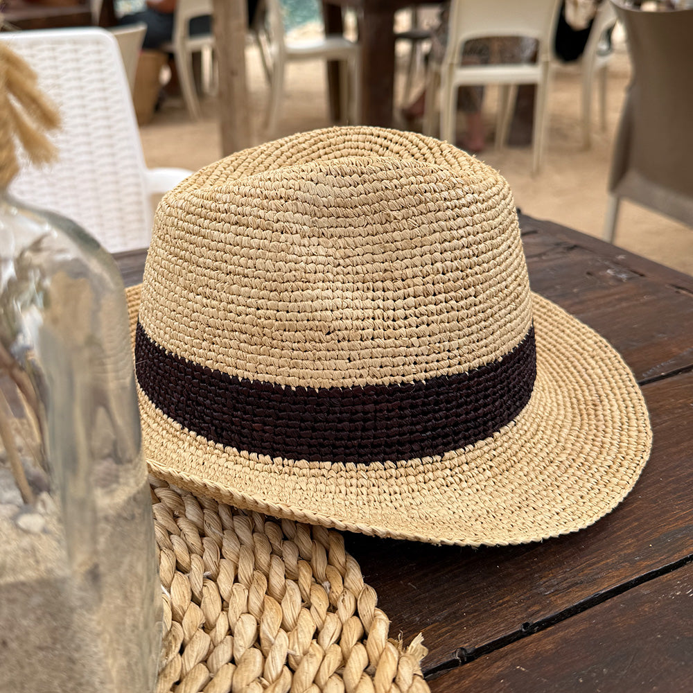 Lovelies Studio - What truly sets the Viviani hat apart is its intricate weaving technique, which transforms the raffia into a timeless silhouette. The result is a beautifully structured hat that effortlessly combines elegance with a touch of rustic charm, perfect for adding a chic flair to any summer ensemble