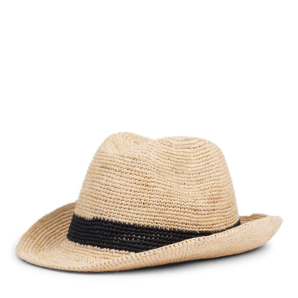 The Summery Viviani hat, a stunning creation meticulously crafted by local artisans in Madagascar exclusively for Lovelies Studio. Each piece is a testament to the skill and dedication of these artisans, who handcraft every detail with precision and care. Made from raffia, a natural fiber renowned for its durability and flexibility, the Viviani hat is not only stylish but also eco-friendly. The raffia is carefully colored by hand using traditional methods