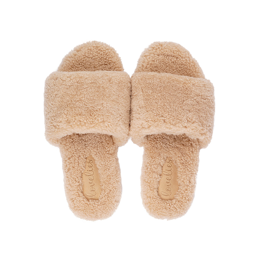 Lovelies Studio - Soft and cosy shearling slippers Lovelies shearling slippers are the essence of comfortability. When you’re in the need of surrounding your feet in soft and warm slippers, Lovelies shearling slippers are the answer. With soft and durable soles, warm shearling and a gorgeous design, you’ll never want to wear any other home-shoe to make you feel at ease.