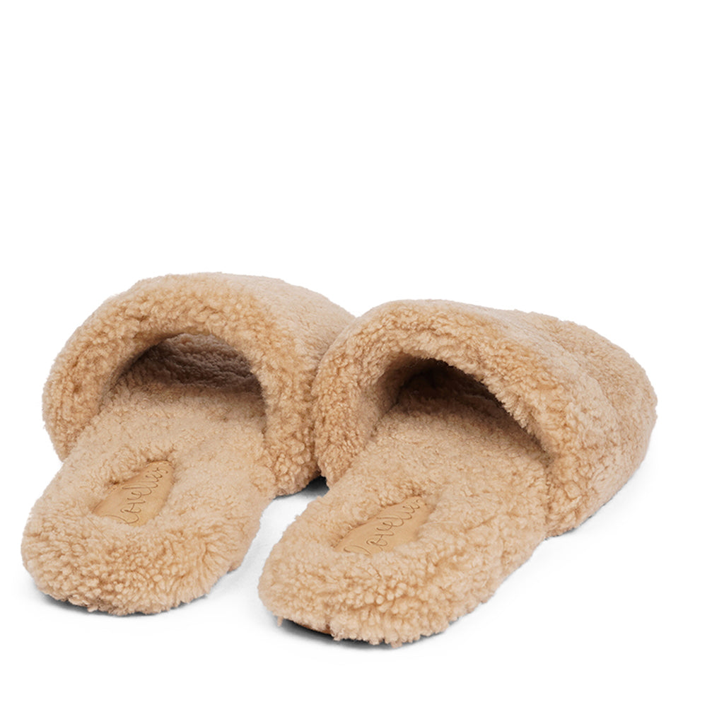 Lovelies Studio - Soft and cosy shearling slippers Lovelies shearling slippers are the essence of comfortability. When you’re in the need of surrounding your feet in soft and warm slippers, Lovelies shearling slippers are the answer. With soft and durable soles, warm shearling and a gorgeous design, you’ll never want to wear any other home-shoe to make you feel at ease.
