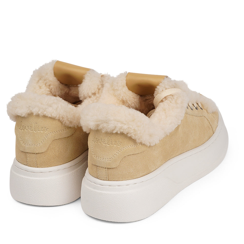 At the foundation of the Zanja low sneaker lies a soft yet durable rubber sole, ensuring long-lasting wear and exceptional grip. The upper is adorned with suede and features charming shearling details, adding a touch of luxury to your every step. Whether you're dressing up for a night out or aiming for a more casual look, these sneakers effortlessly elevate your style.