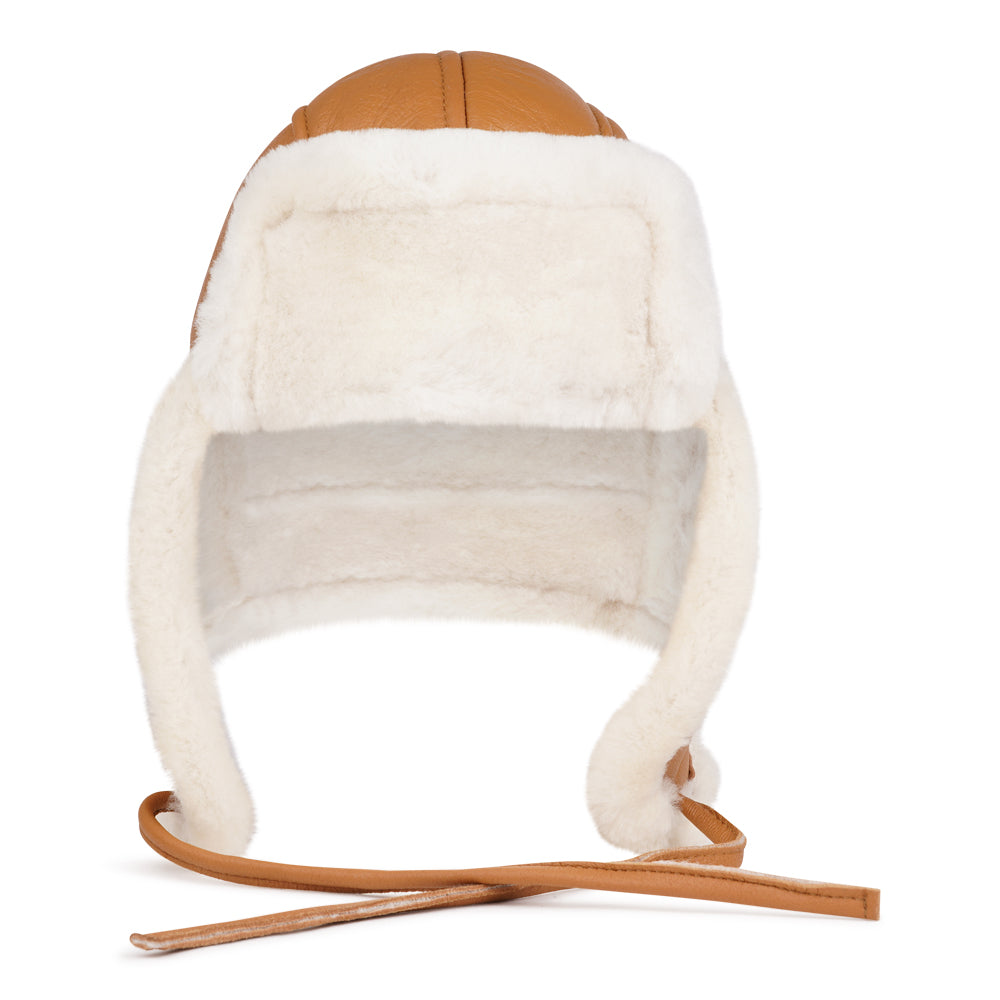 Lovelies Studio - Denmark - The unique design of the Zhuomala One Side Shearling Hat features a one-sided shearling construction, ensuring both warmth and a distinctive flair. The natural insulating properties of Australian sheepskin make this hat a reliable companion against the winter chill, providing a cocoon of coziness for your head and ears.