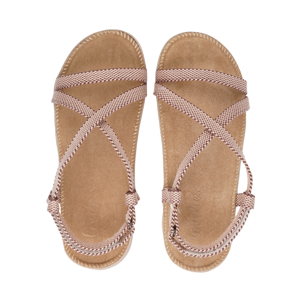 Lovelies Studio - Danish design - Aguas Blanca, the epitome of comfort and style in a sandal. Experience unparalleled softness with its luxurious suede insole, complemented by a double layer of sturdy rubber soles that provide the perfect bounce in every step. The innovative design features straps that elegantly encircle the heel, ensuring an impeccable fit and secure hold. Elevate your footwear game with Aguas Blanca – where cushioned elegance meets durable sophistication.