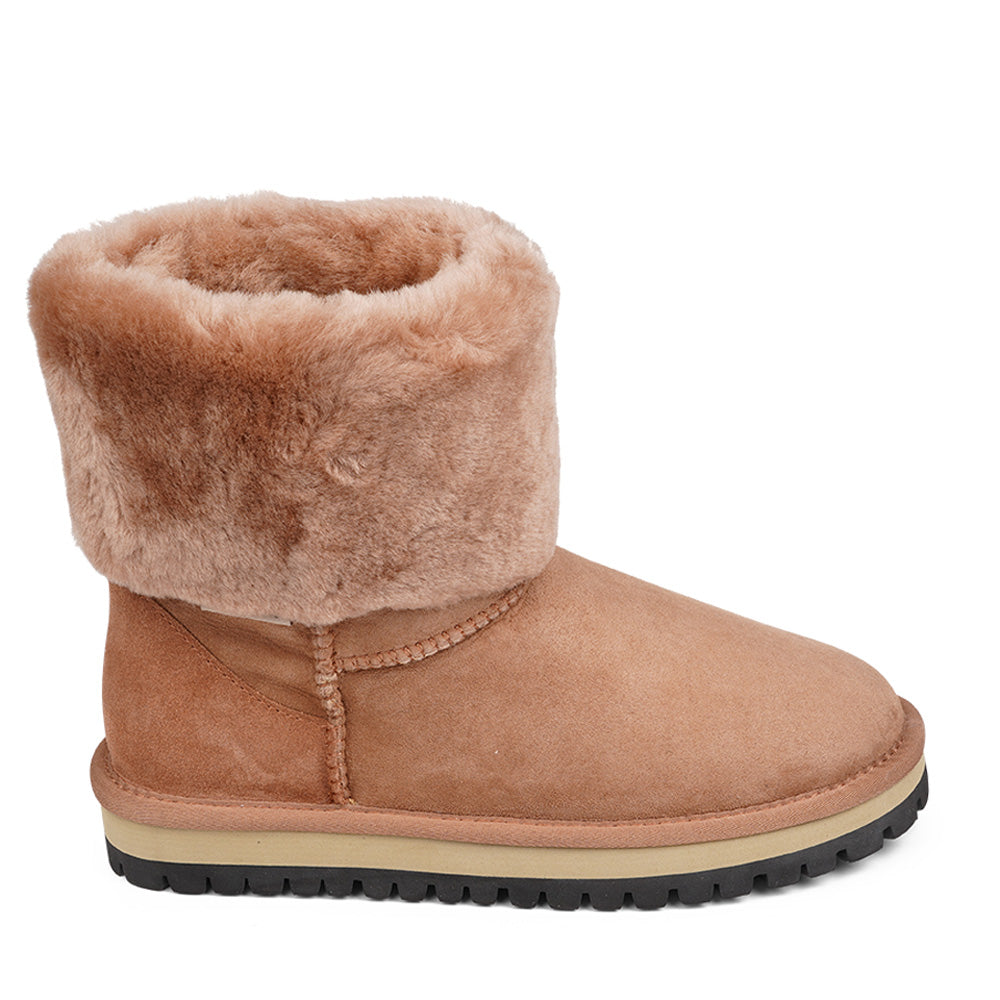 Lovelies Studio - Mid-high Shearling boots  Lovelies shearling boots bring softness and warmth to your feet this autumn. With soft and durable rubber soles plus a gorgeous design you're perfectly suited for the wintertime.  Danish Design