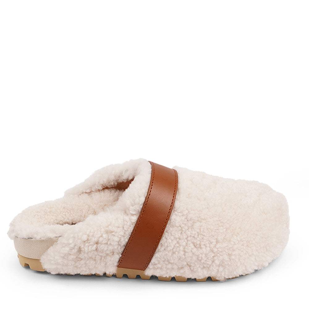 Lovelies Studio - fashion mules in sude and shearling. Suede mules with curly shearling lining Lovelies shearling mules will bring softness and warmth to your feet this autumn. The combination of soft curly shearling and the durable cork and rubber sole guarantees the utmost comfort to the wearer.