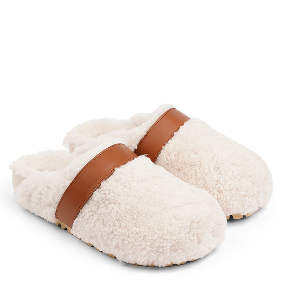 Lovelies Studio - fashion mules in sude and shearling. Suede mules with curly shearling lining  Lovelies shearling mules will bring softness and warmth to your feet this autumn. The combination of soft curly shearling and the durable cork and rubber sole guarantees the utmost comfort to the wearer.