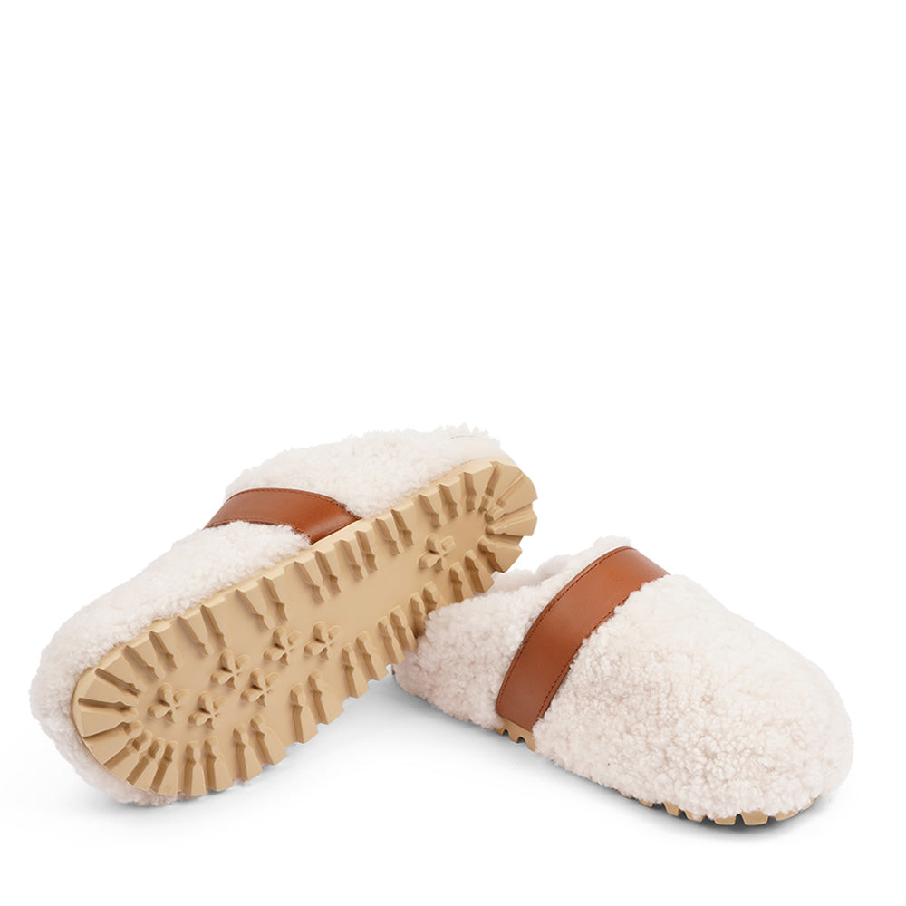 Lovelies Studio - fashion mules in sude and shearling. Suede mules with curly shearling lining  Lovelies shearling mules will bring softness and warmth to your feet this autumn. The combination of soft curly shearling and the durable cork and rubber sole guarantees the utmost comfort to the wearer.