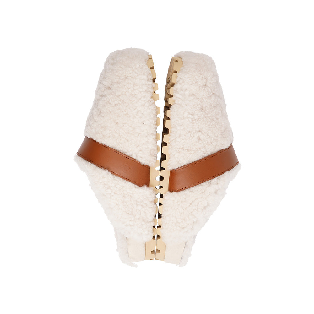 Lovelies Studio - fashion mules in sude and shearling. Suede mules with curly shearling lining Lovelies shearling mules will bring softness and warmth to your feet this autumn. The combination of soft curly shearling and the durable cork and rubber sole guarantees the utmost comfort to the wearer.
