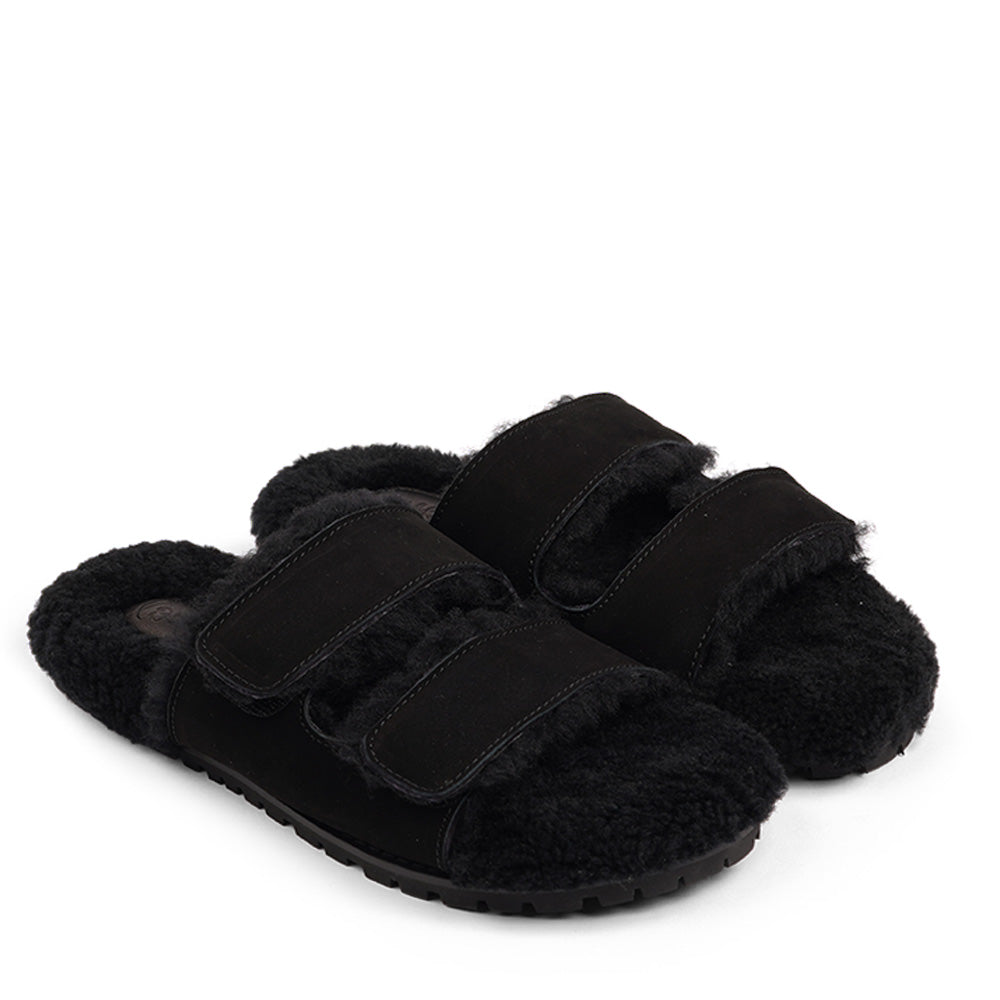 Lovelies Studio - Adjustable Nubuck sandals with shearling lining Lovelies shearling sandals will bring softness and warmth to your feet this autumn. The combination of soft shearling and rubber sole guarantees the utmost comfort to the wearer. Lovelies Studio is a Danish brand.