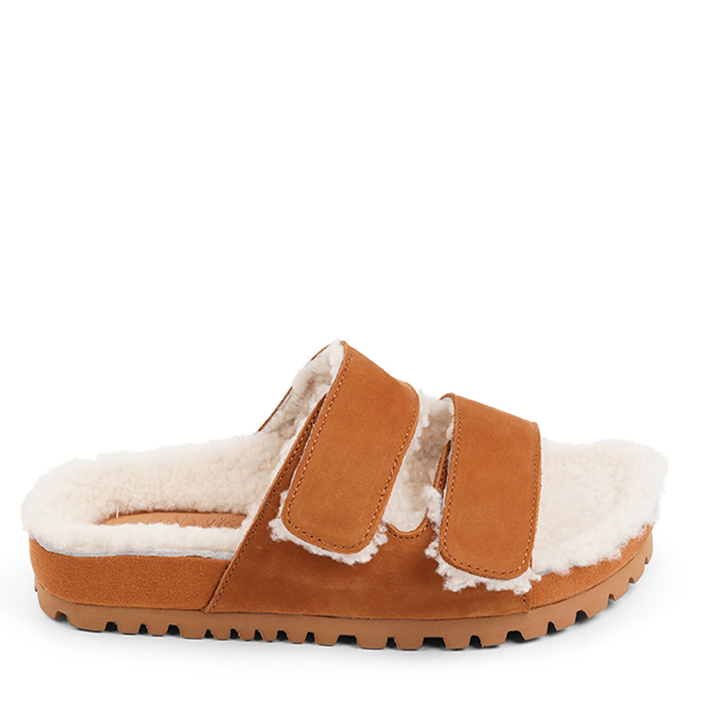 Lovelies Studio - Adjustable Nubuck sandals with shearling lining  Lovelies shearling sandals will bring softness and warmth to your feet this autumn. The combination of soft shearling and rubber sole guarantees the utmost comfort to the wearer. Lovelies Studio is a Danish brand.