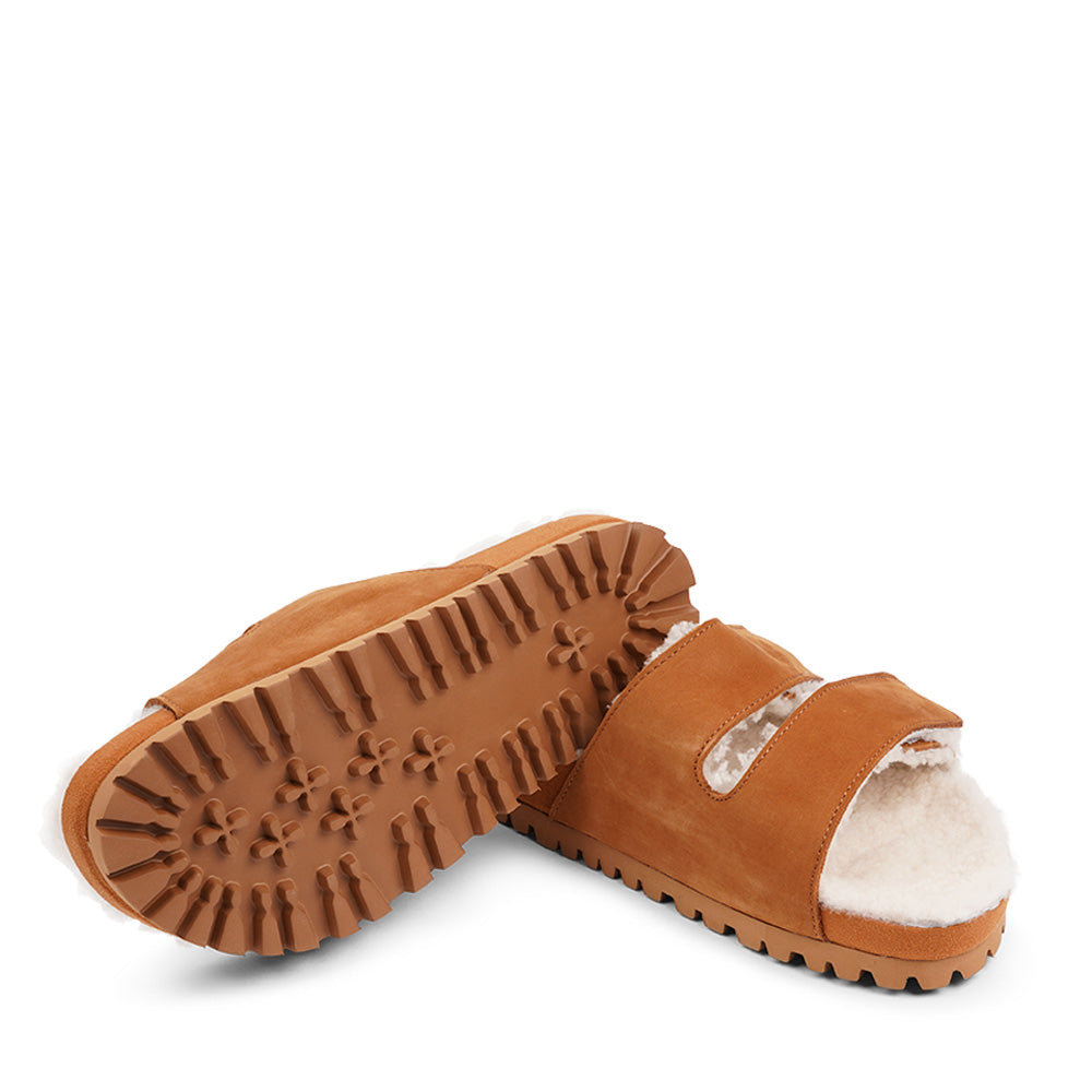 Lovelies Studio - Adjustable Nubuck sandals with shearling lining  Lovelies shearling sandals will bring softness and warmth to your feet this autumn. The combination of soft shearling and rubber sole guarantees the utmost comfort to the wearer. Lovelies Studio is a Danish brand.