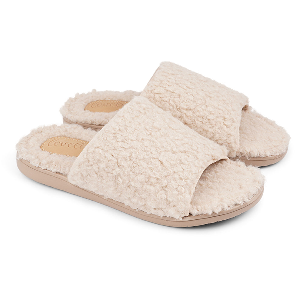 Santi Lounge Slippers from Lovelies. Soft rubber sole with warm and cosy fur. Lovelies leather Logo in the sole. LL7131 Lovelies lounge slippers are the essence of comfortability. When you’re in the need of surrounding your feet in soft and warm slippers, Lovelies lounge slippers are the answer. With soft and durable soles, fine wool and a gorgeous design, you’ll never want to wear any other home-shoe to make you feel at ease.