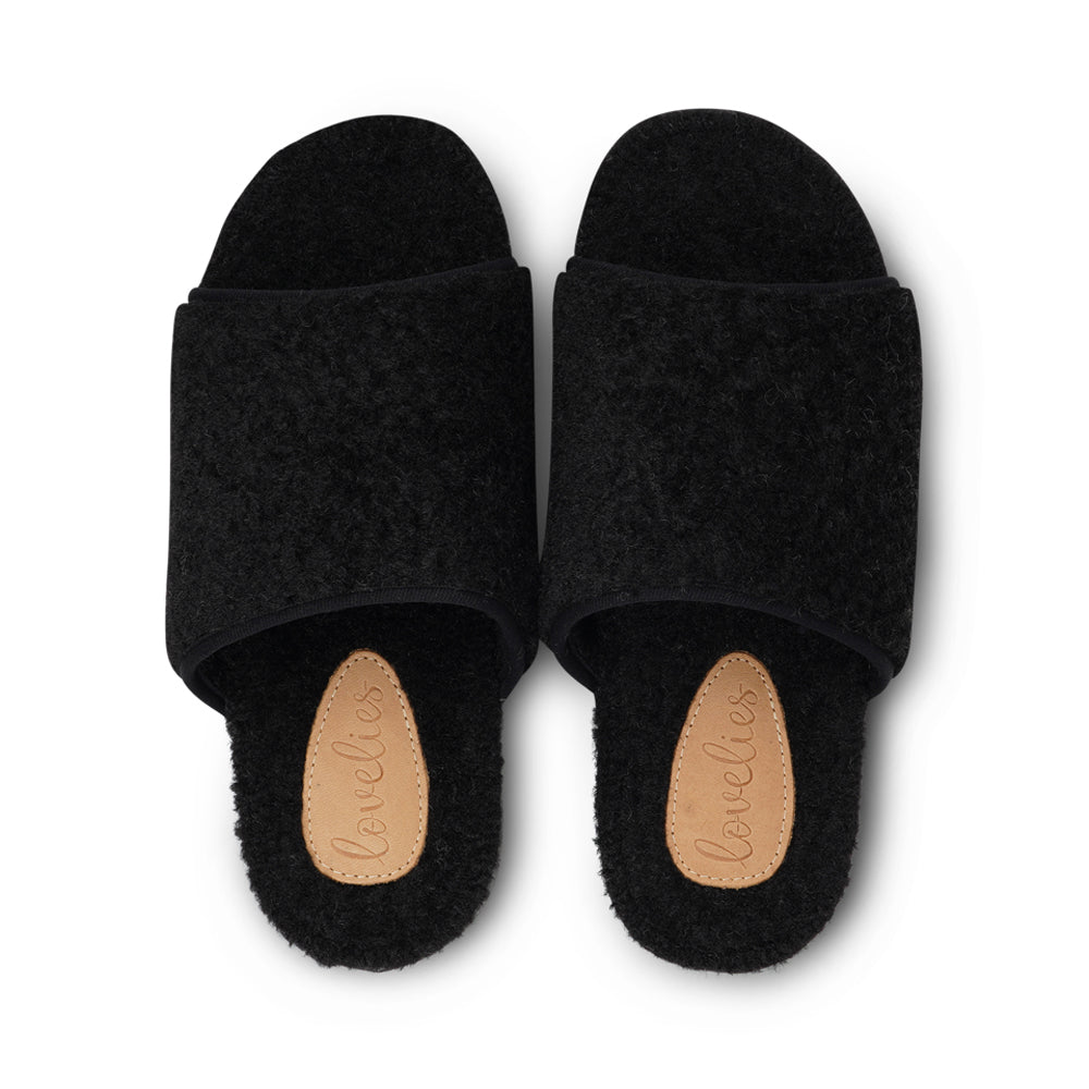 Soft and cosy lounge slippers Lovelies lounge slippers are the essence of comfortability. When you’re in the need of surrounding your feet in soft and warm slippers, Lovelies lounge slippers are the answer. With soft and durable soles, fine wool and a gorgeous design, you’ll never want to wear any other home-shoe to make you feel at ease. Enjoy your Lovelies! See our Size Guide Material: Outsole / Insole : Rubber Footbed: Curly faux fur Lining: Curly faux fur Upper: Curly faux fur