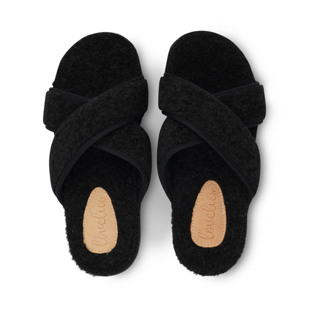 Soft and cosy lounge slippers Lovelies lounge slippers are the essence of comfortability. When you’re in the need of surrounding your feet in soft and warm slippers, Lovelies lounge slippers are the answer. With soft and durable soles, fine wool and a gorgeous design, you’ll never want to wear any other home-shoe to make you feel at ease. Enjoy your Lovelies! See our Size Guide Material: Outsole / Insole : Rubber Footbed: Curly faux fur Lining: 80% Wool – 20% polyester Upper: Curly faux fur