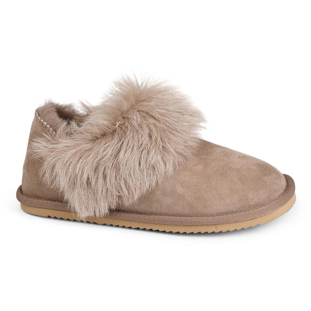 Soft and cosy shearling slippers  Lovelies shearling slippers are the essence of comfortability. When you’re in the need of surrounding your feet in soft and warm slippers, Lovelies shearling slippers are the answer. With soft and durable soles, warm shearling and a gorgeous design, you’ll never want to wear any other home-shoe to make you feel at ease.