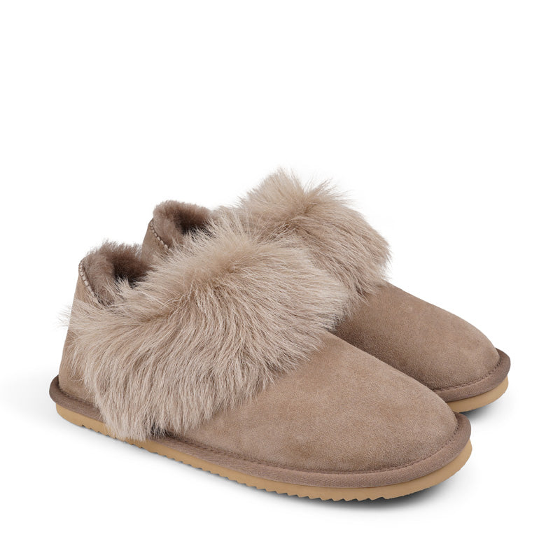 Soft and cosy shearling slippers  Lovelies shearling slippers are the essence of comfortability. When you’re in the need of surrounding your feet in soft and warm slippers, Lovelies shearling slippers are the answer. With soft and durable soles, warm shearling and a gorgeous design, you’ll never want to wear any other home-shoe to make you feel at ease.