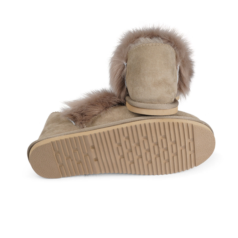 Soft and cosy shearling slippers with heel cap  Lovelies shearling slippers are the essence of comfortability. When you’re in the need of surrounding your feet in soft and warm slippers, Lovelies shearling slippers are the answer. With soft and durable soles, warm shearling and a gorgeous design, you’ll never want to wear any other home-shoe to make you feel at ease.