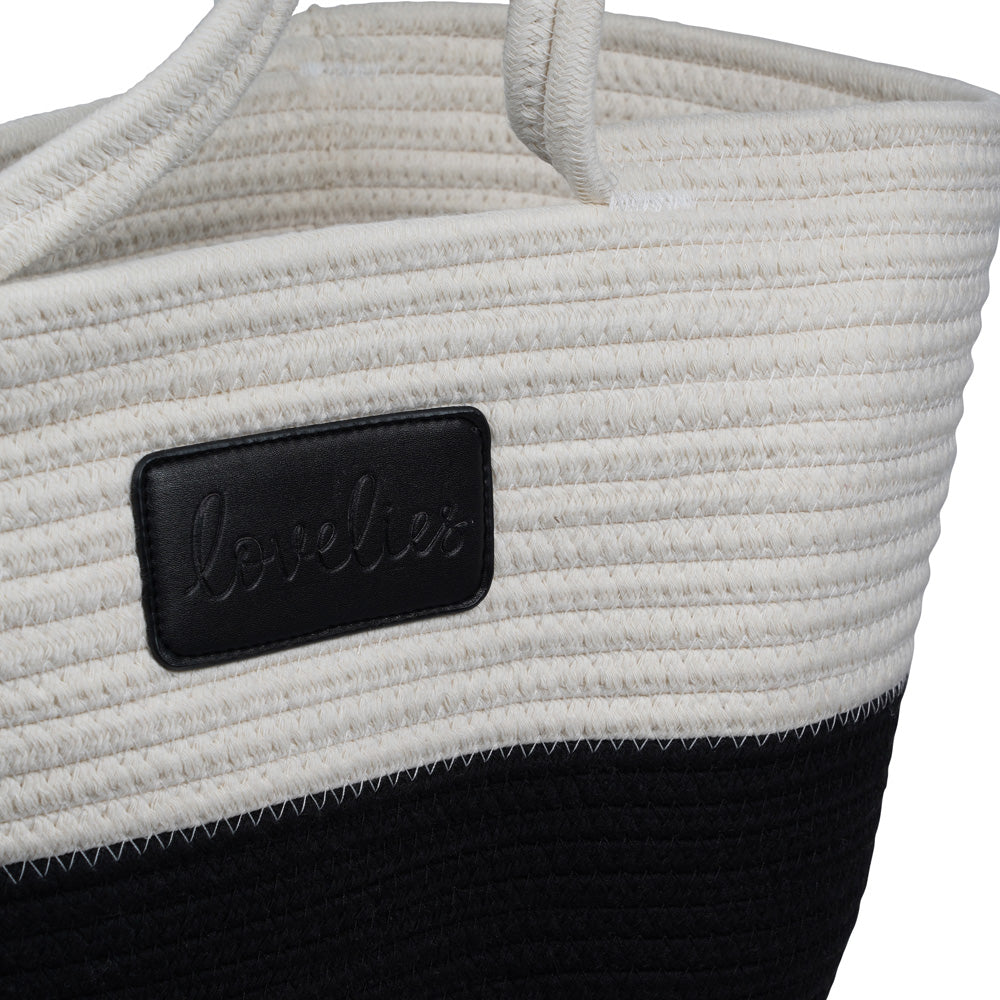 Lovelies Studio - Danish design - The NADI beach bag features a sleek and clean design, with a white upper that exudes a sense of effortless elegance. Adding a stylish twist, the bottom is adorned with a vibrant contrast color, making it a true standout accessory. At Lovelies, we prioritize both style and sustainability. That's why our Flamencos beach bag is made from a blend of cotton and recycled polyester, offering durability while minimizing our environmental impact.