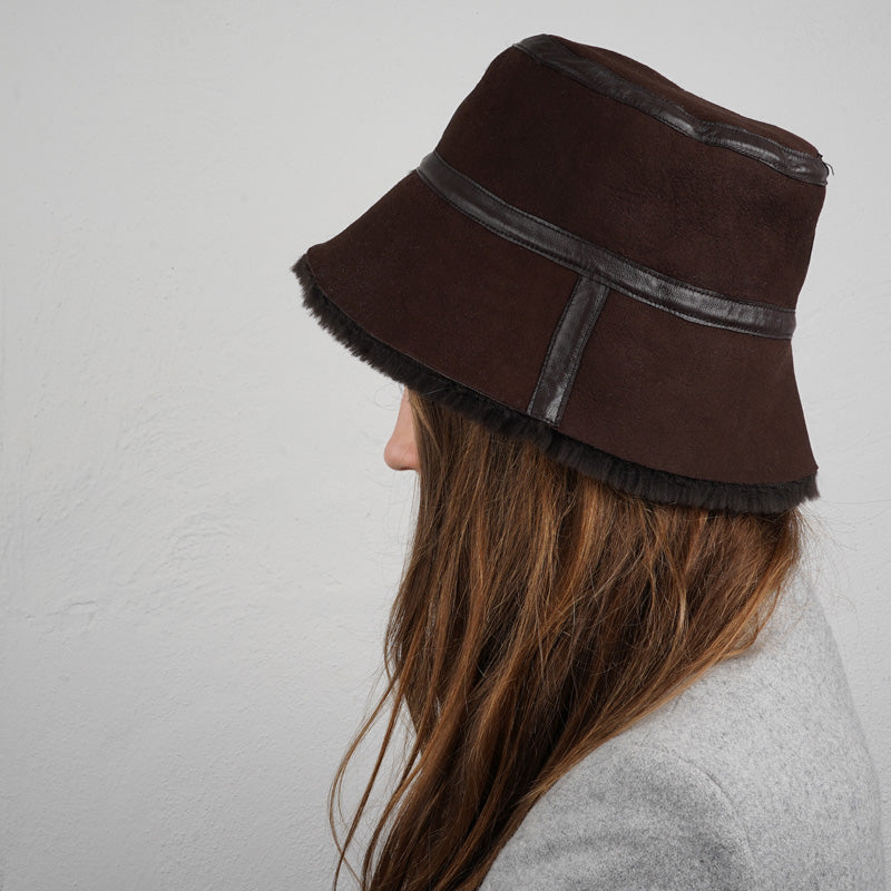 Would you like to stay warm and trendy this winter then the Nanga bucket hat could be a great add on to your wardrobe.  Material:  Made with 100% Sheepskin. This incredible material balances form with function, offering a chic look with lightweight insulation in the winter and temperature regulation when spring arrives.