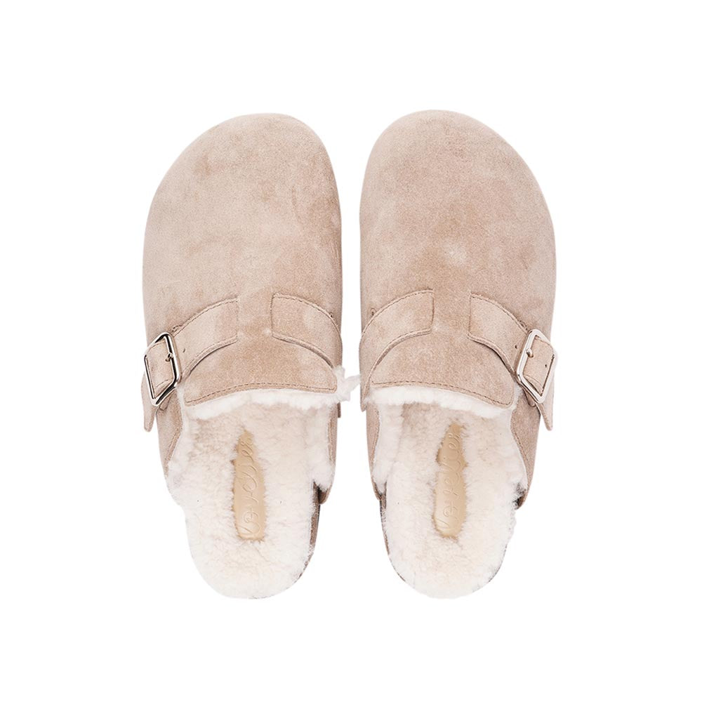 Suede Mules with adjustable buckle and curly shearling lining Lovelies shearling mules will bring softness and warmth to your feet this summer. The combination of soft curly shearling and the durable rubber sole guarantees the utmost comfort to the wearer. Nesso Mules in Taupe from Danish Lovelies Studio.