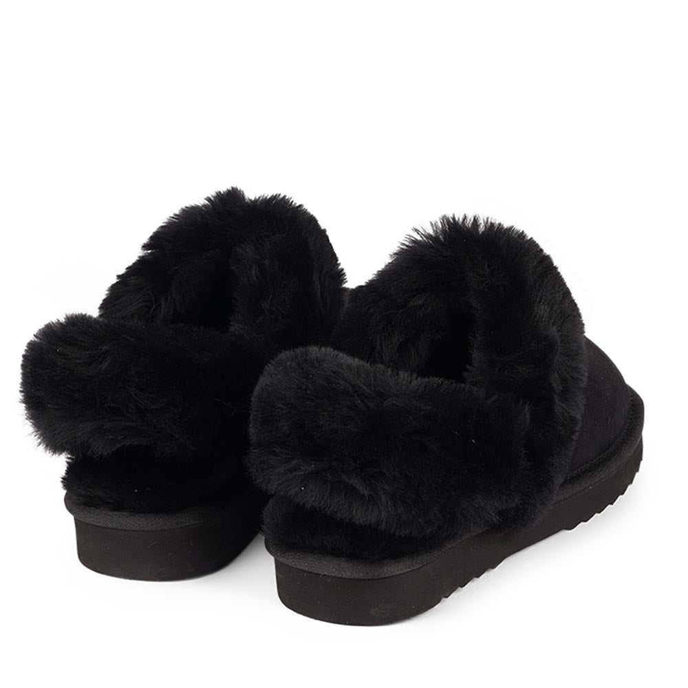 Lovelies Studio - Ombo - Black. Double faced shearling mules with detachable heel strap Lovelies shearling mules will bring softness and warmth to your feet this summer. The combination of soft curly shearling and the durable rubber sole guarantees the utmost comfort to the wearer.