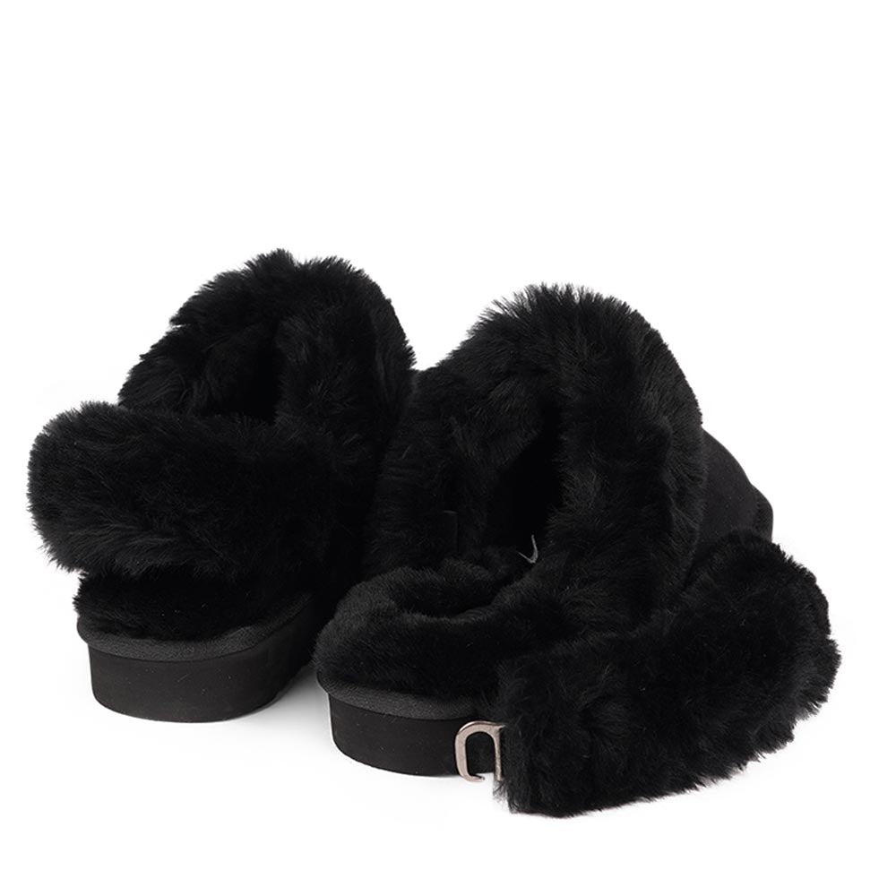 Lovelies Studio - Ombo - Black. Double faced shearling mules with detachable heel strap Lovelies shearling mules will bring softness and warmth to your feet this summer. The combination of soft curly shearling and the durable rubber sole guarantees the utmost comfort to the wearer.