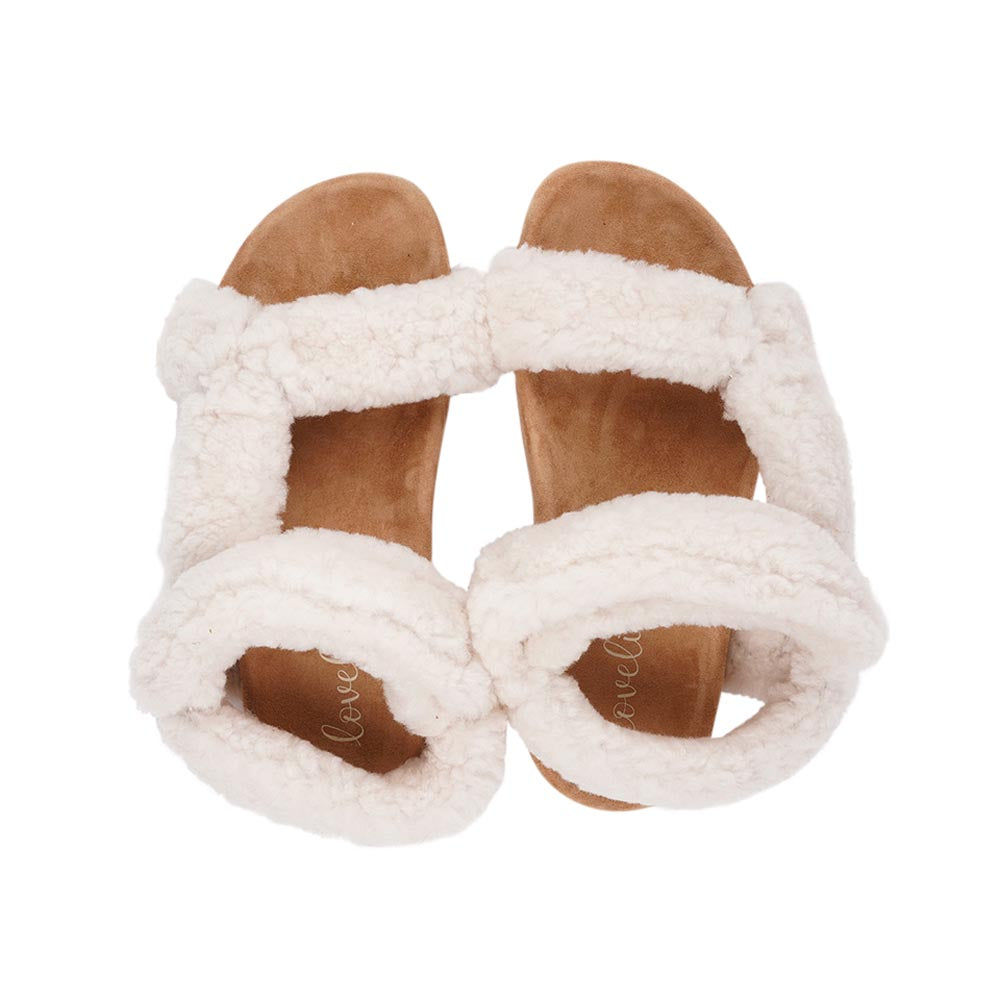Since 2019 Lovelies Studio has been creating shoes and leathergoods for women and men inspired by an open mind, Scandinavian minimalism and a bit of vintage influences. The fashionable trekking sandal from Lovelies is hand made of the finest Australian curly shearling. With a soft midsole and adjustable straps we can secure a perfect fit.