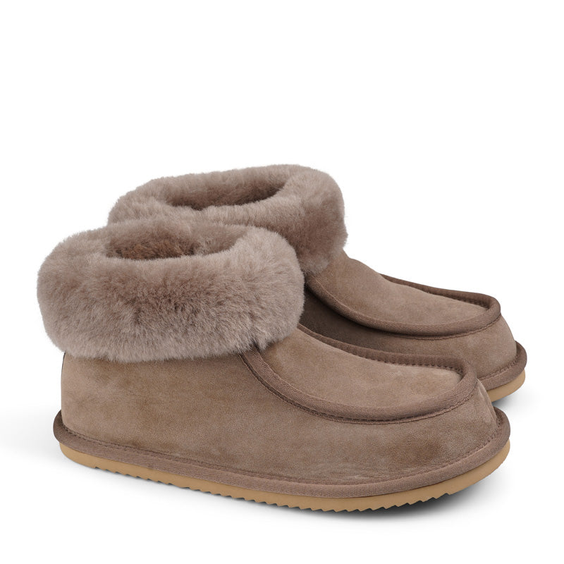 Soft and cosy shearling slippers with heel cap  Lovelies shearling slippers are the essence of comfortability. When you’re in the need of surrounding your feet in soft and warm slippers, Lovelies shearling slippers are the answer. With soft and durable soles, warm shearling and a gorgeous design, you’ll never want to wear any other home-shoe to make you feel at ease.