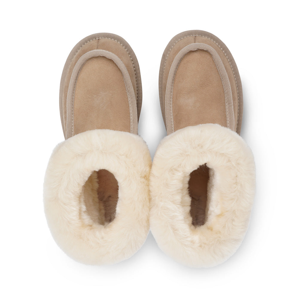 Soft and cosy shearling slippers   Lovelies shearling slippers are the essence of comfortability. When you’re in the need of surrounding your feet in soft and warm slippers, Lovelies shearling slippers are the answer. With soft and durable soles, warm shearling and a gorgeous design, you’ll never want to wear any other home-shoe to make you feel at ease.