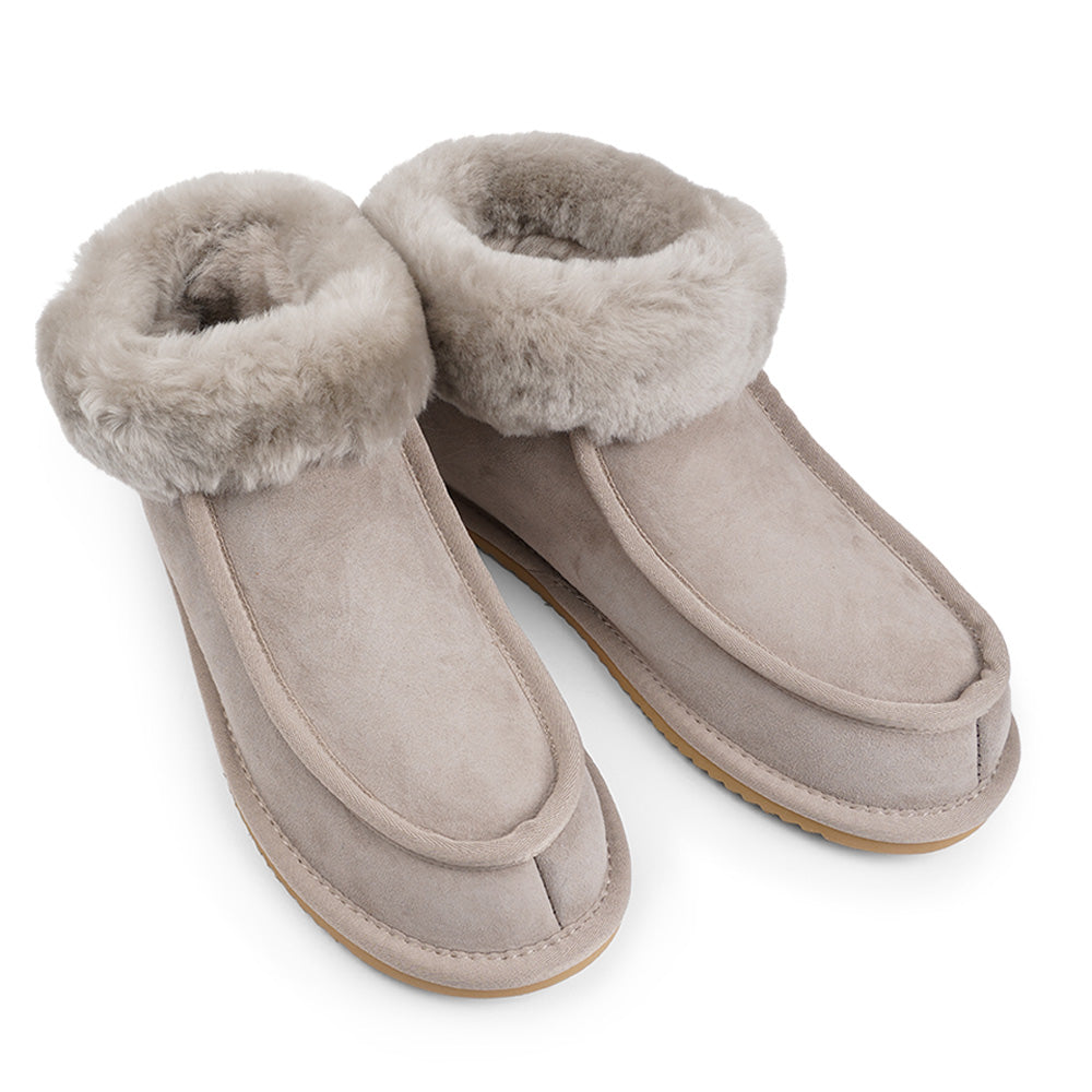 Soft and cosy shearling high slippers  Lovelies shearling high slippers are the essence of comfortability. When you’re in the need of surrounding your feet in soft and warm slippers, Lovelies shearling slippers are the answer. With soft and durable soles, warm shearling and a gorgeous design, you’ll never want to wear any other home-shoe to make you feel at ease.