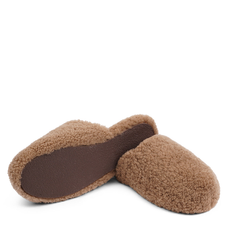 Lovelies Studio hand made home shoes of Australien shearling - High quality and really good fit. Lovelies shearling slippers are the essence of comfortability. When you’re in the need of surrounding your feet in soft and warm slippers, Lovelies shearling slippers are the answer. With soft and durable soles, warm shearling and a gorgeous design, you’ll never want to wear any other home-shoe to make you feel at ease. Tirich Mir Shearling slippers from Lovelies Studio Denmark