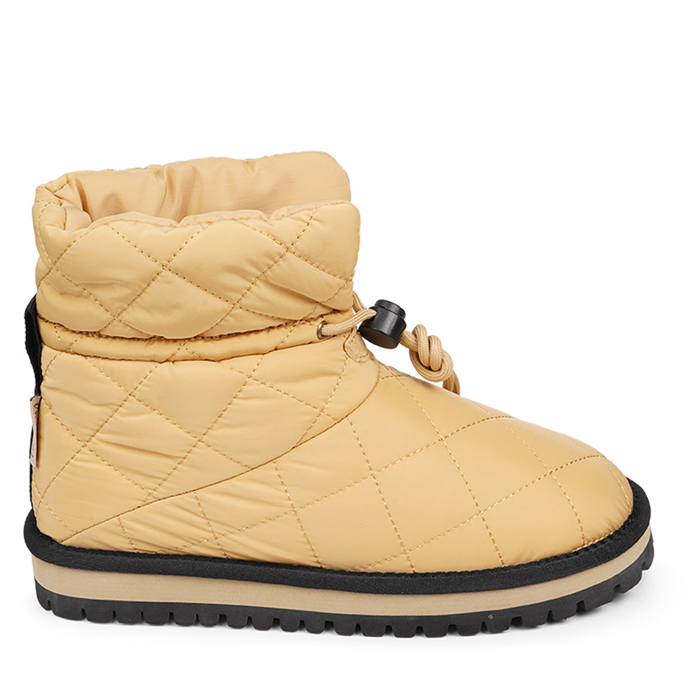 Lovelies Studio Nylon ankle boots with shearling lining. The shearling lining bring softness and warmth to your feet this autumn. With soft and durable rubber soles plus a gorgeous design you're perfectly suited for the wintertime. The Quilted nylon is water resistant and all shearling is from Australia. Outsole / Insole : Rubber 3 cm high Footbed: Shearling Lining: Shearling Upper: Quilted nylon LWG Environmental GOLD RATED Certification