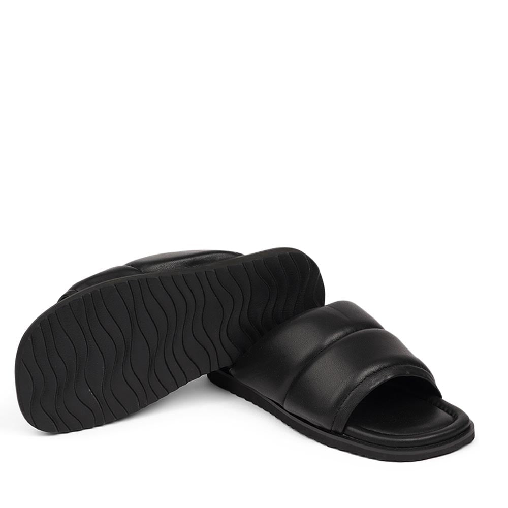 Lovelies Studio - Vesime sandals. Feminine and comfortable nappa leather sandals with a super puffy wide strap.  With its delicate and soft fabrics, you feel at ease and elegant at the same time. The easy to-go sandals will fit to your feminine dress or your summer jeans.  Size and fit:  True to size If you are between sizes, we recommend taking the next size up. See our Size Guide  Material:  Outsole / Insole : Rubber  Footbed: Nappa leather Lining: Nappa leather Upper: Nappa leather