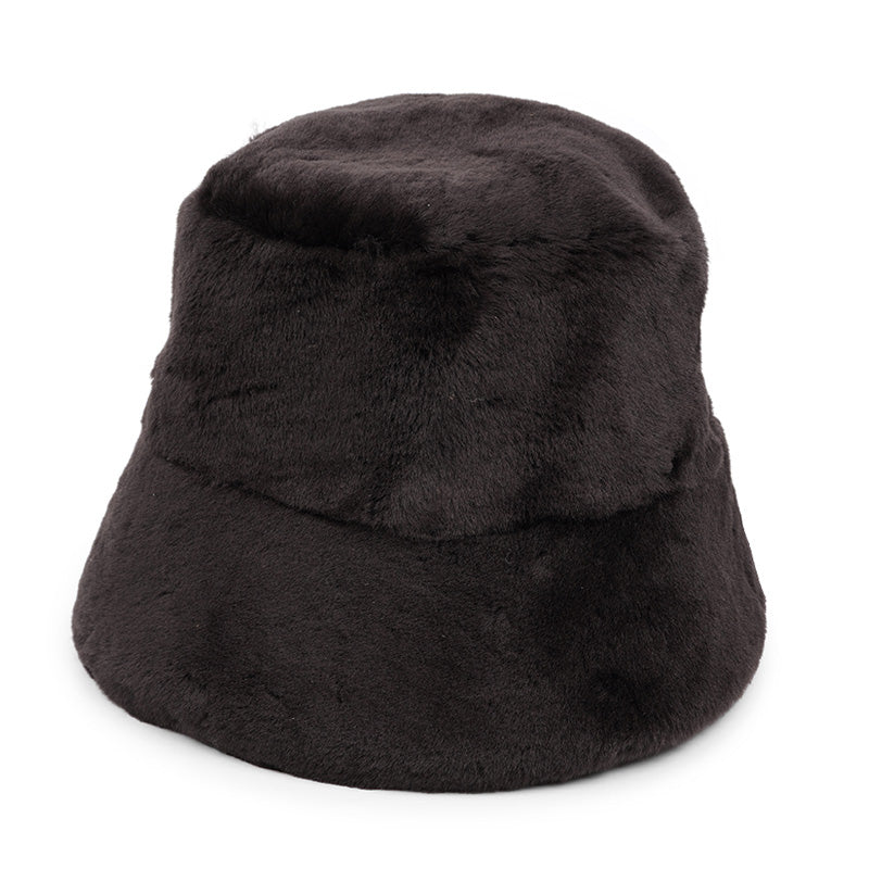 Lovelies Studio, the Danish brand. The cool Whitney shearling bucket hat is made of beautiful soft sheep fur both inside and outside.  Made with 100% Sheepskin. This incredible material balances form with function, offering a chic look with lightweight insulation in the winter and temperature regulation when spring arrives.